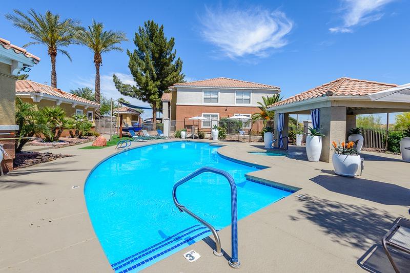 Resort Style Pool and Spa | On a beautiful sunny day, hang out pool-side and grill up some delicious eats with our stainless steel grill! We are excited to offer in-person tours while following social distancing and we encourage all visitors to wear a face covering.