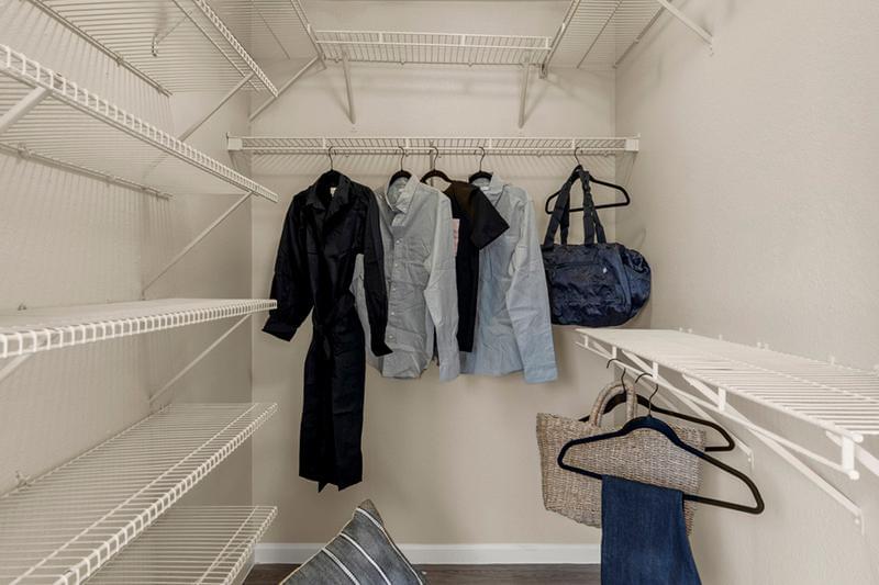 Walk-In Closet | Our master bedroom boasts a walk in closet that is a shopaholic’s dream.