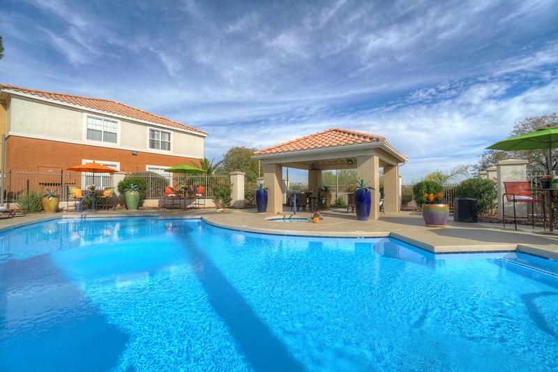 Resort-Style Pool | On a beautiful sunny day, hang out pool-side and grill up some delicious eats with our stainless steel grill! We are excited to offer in-person tours while following social distancing and we encourage all visitors to wear a face covering.