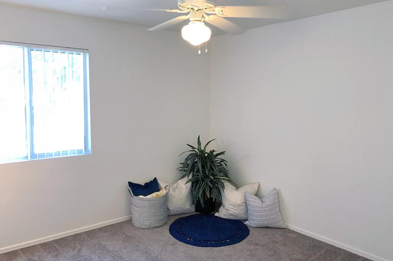 Classic Bedroom | Spacious bedrooms with plush carpeting and large windows.