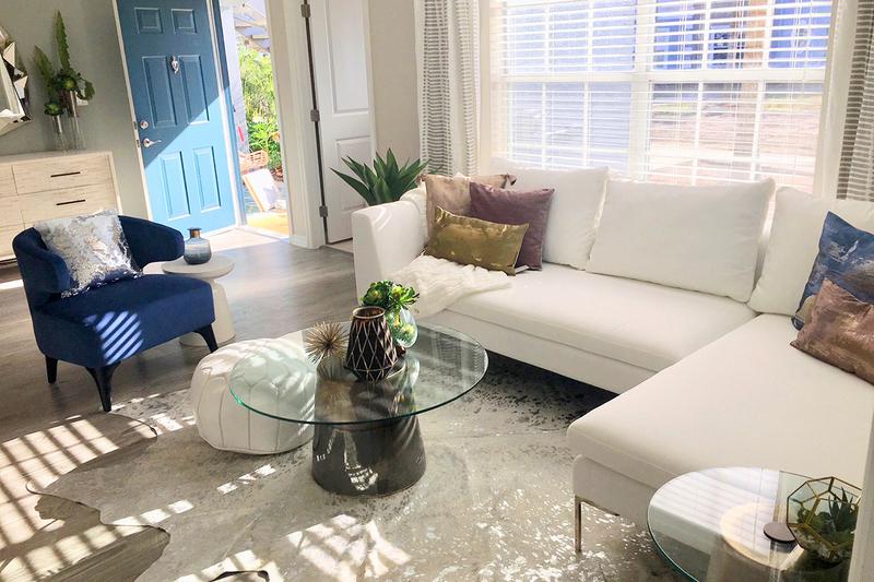 Signature Living Room | Our signature style living rooms featuring grey wood-style flooring.