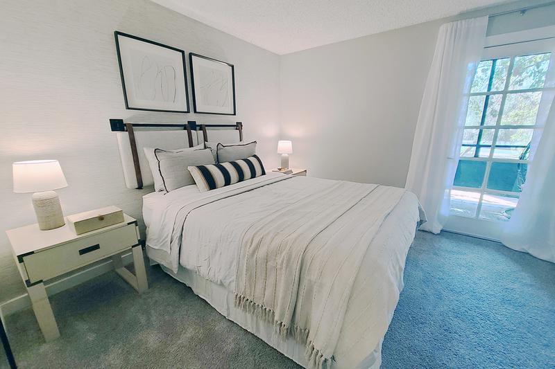 Master Bedroom | Master bedrooms featuring a walk-in closet and a private patio.