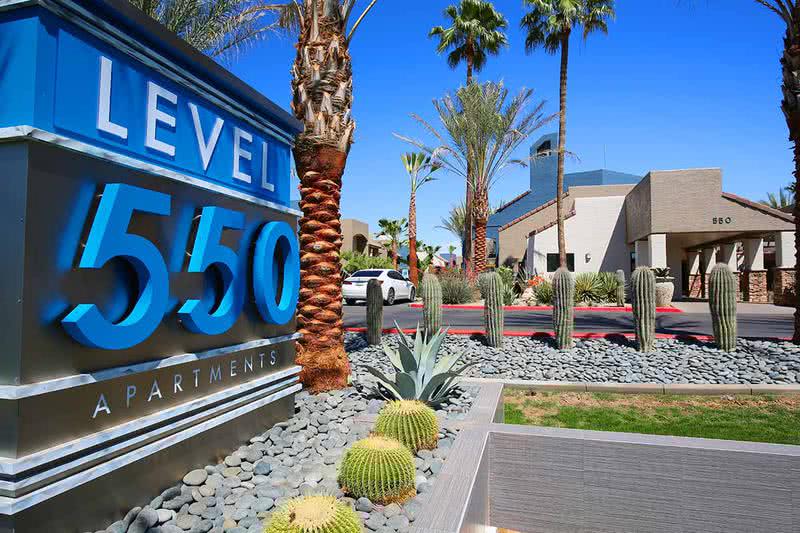 Welcome to Level 550 | You will be welcomed home with lush landscaping around the community.