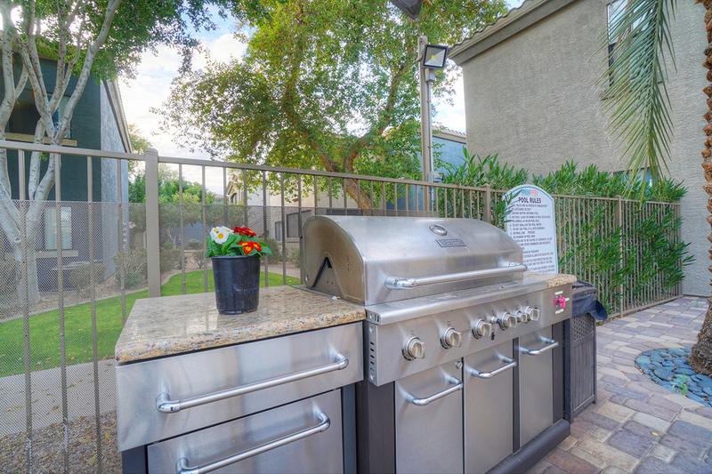 Outdoor Kitchen | Cookout by the pool utilizing our gas grill.
