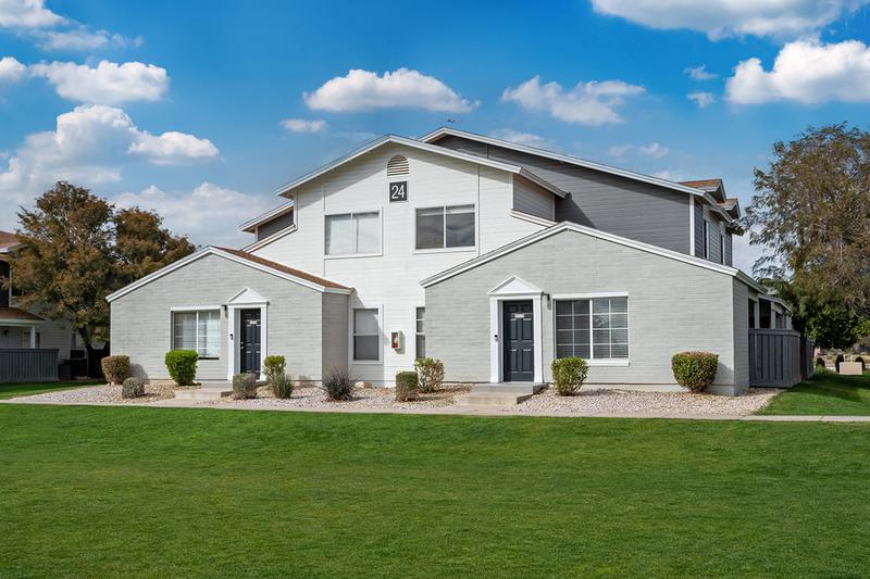 Building Exterior | You'll be welcomed home with lush landscaping and freshly painted buildings.