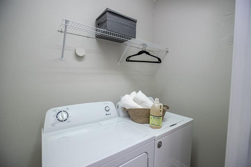 Full Size Washer & Dryer | Our laundry rooms offer additional storage space for your home.