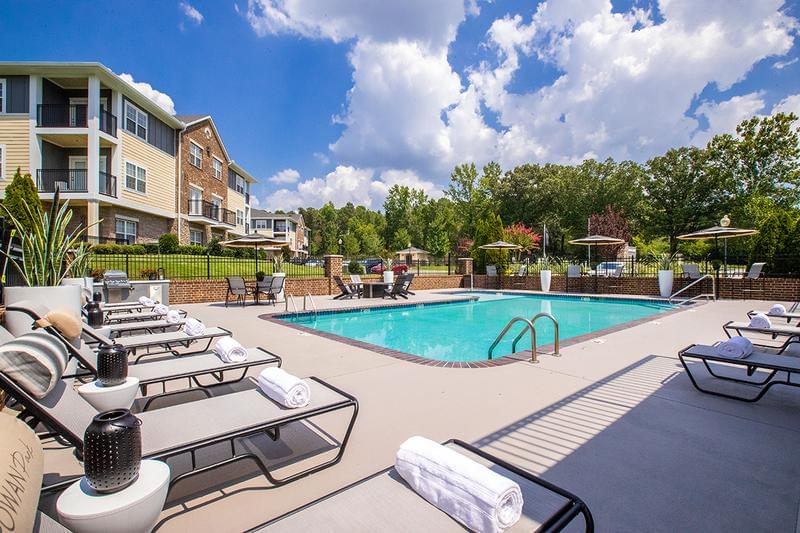 Resort-Style Pool | Take a dip in our resort-style pool and relax on one of our poolside loungers.