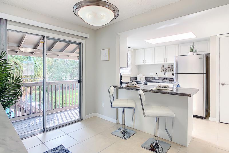 Open Kitchen with Breakfast Bar | Your new kitchen features a breakfast bar overlooking the dining area and living room.