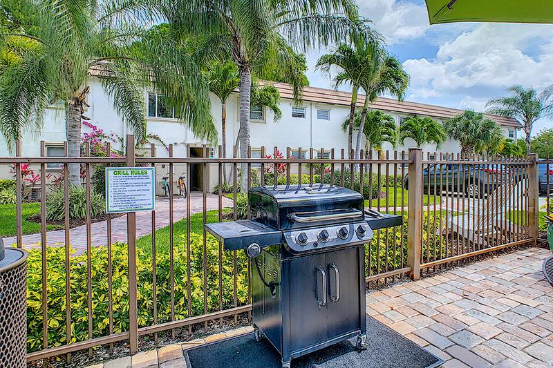 Gas Grills | Utilize our gas grills by the pool to have a cookout with friends and family.