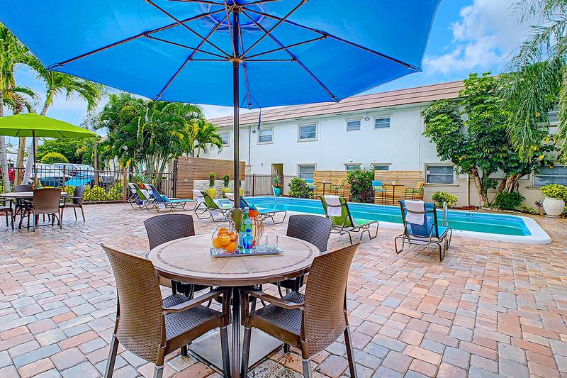 Expansive Sundeck | Lay out on one of our poolside loungers, or relax at one of our tables with umbrellas on our expansive sundeck.