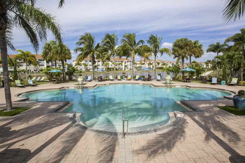 Sparkling Swimming Pool | Expansive Sundeck with Cabanas and WiFi.