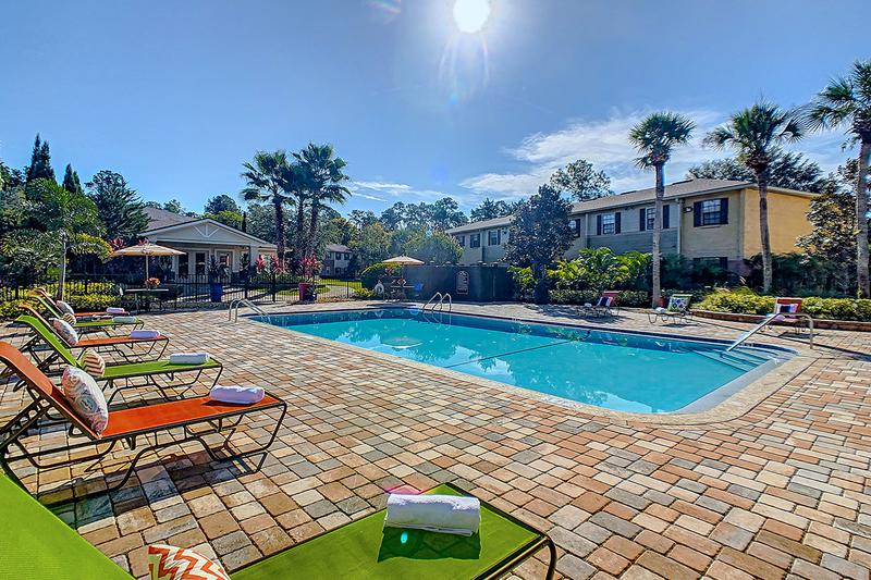 Expansive Sundeck | The Ridgemar Commons resort-style pool is equipped with free Wi-Fi for our residents, who are looking to take a break and relax after a busy day.