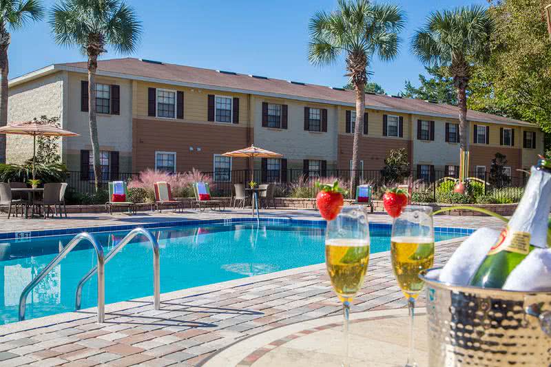 Expansive Sundeck | The Ridgemar Commons resort-style pool is equipped with free Wi-Fi for our residents, who are looking to take a break and relax after a busy day.