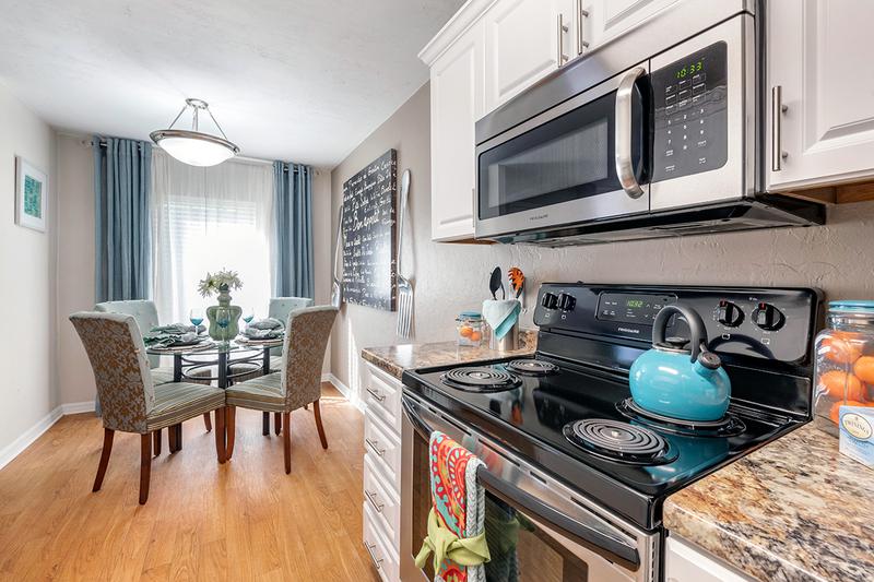 Stainless Steel Appliances | Kitchens feature stainless-steel appliances and granite-style countertops. Kitchens also open up to the separate dining area.