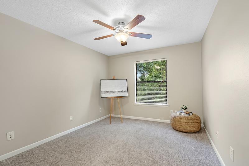 Bedroom | Spacious bedrooms featuring large windows, a multi-speed ceiling fan, and spacious closets.