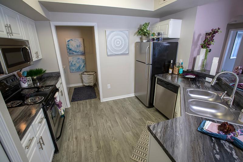 Stainless Steel Appliances | Your newly remodeled kitchen includes ample cabinet space and your very own laundry room.