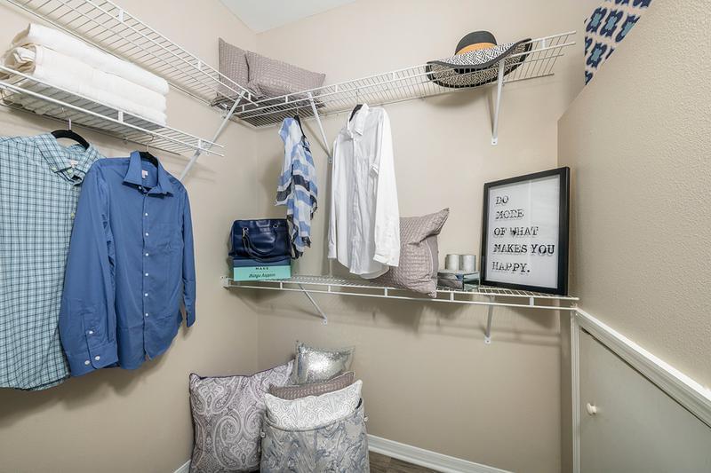 Walk-In Closet | Spacious walk-in closets with organizers.