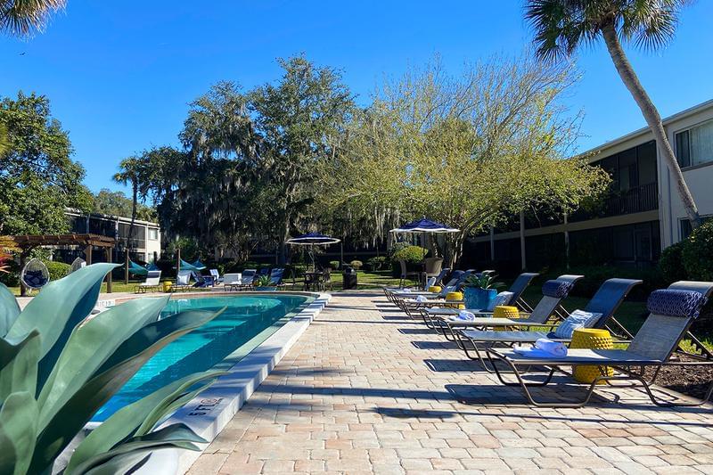 Poolside Loungers | Soak in the sun from one of our comfortable poolside loungers.