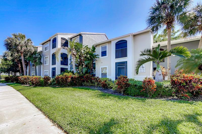 Building Exterior | You'll be welcomed home with lush landscaping and freshly painted buildings.