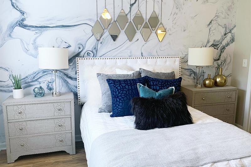 Master Bedroom | Spacious master bedrooms featuring a ceiling fan and walk-in closet.