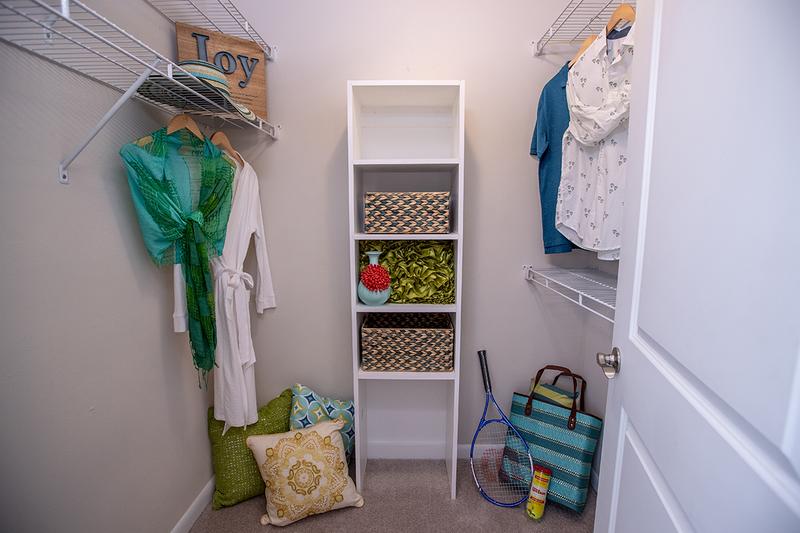Walk-In Closet | Master bedrooms feature spacious walk-in closets with built-in shelving.