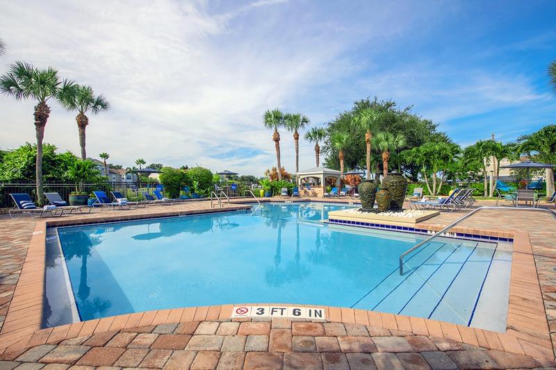 Expansive Sundeck | Lay out on our expansive sundeck featuring plenty of poolside loungers and seating.