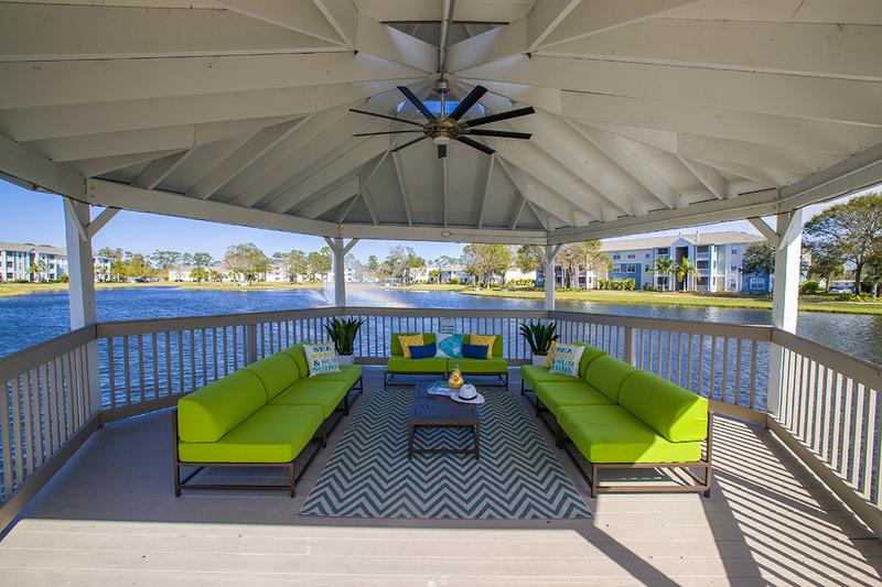 Dock Seating Area | Sit out by the water under our gazebo including seating and a fan.