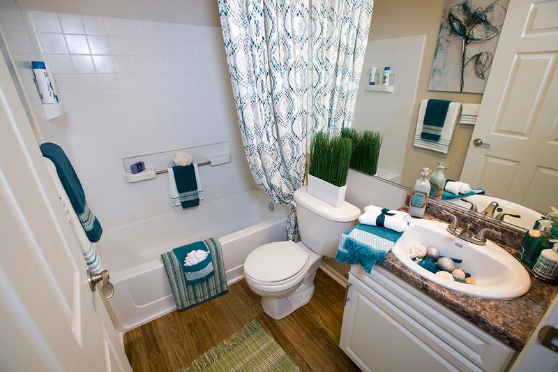 Bathroom | Remodeled bathrooms with updated flooring, countertops, cabinets and fixtures,