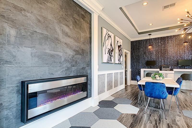 Business Lounge | Have a seat in our business center lounge with fireplace.