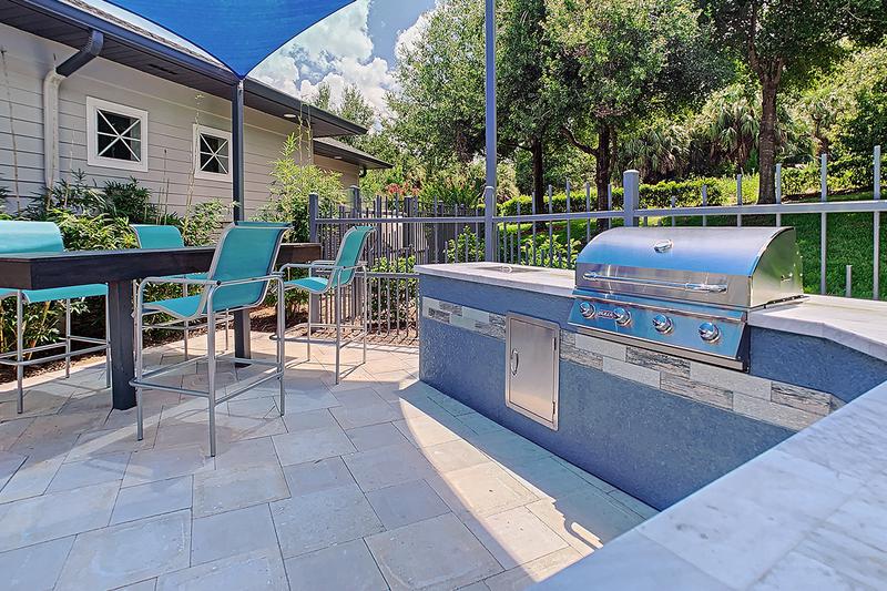 Outdoor Kitchen | Have a cookout at our poolside outdoor kitchen.