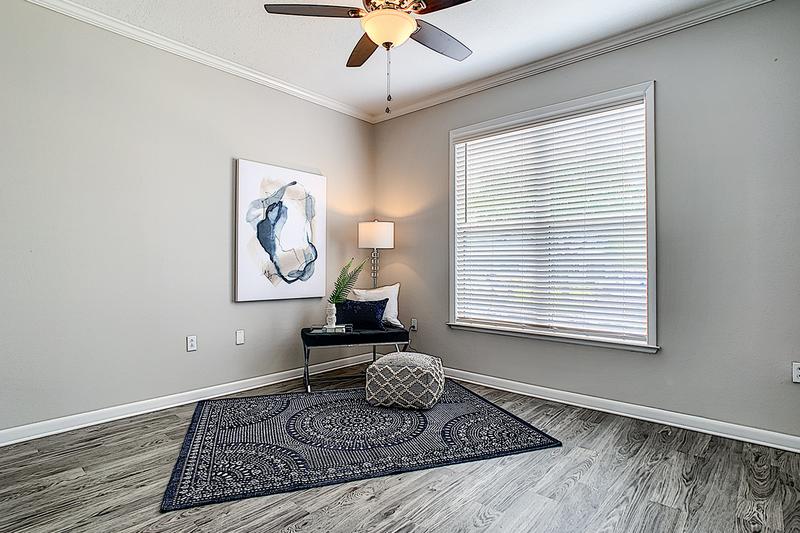Spacious Bedrooms | Bedrooms featuring wood-style flooring and multi-speed ceiling fans.