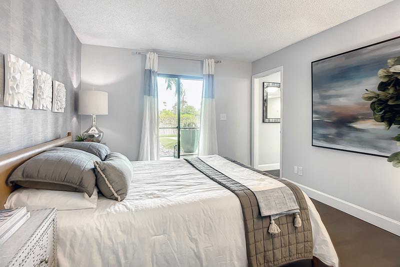 Master Bedrooms with Lanai Access | The Riviera Master Suite has it's own private entrance to the screened in lanai.