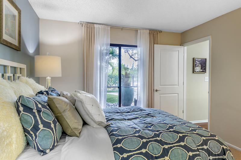 Lanai Access | The Rivieria Master Suite has it's own private entrance to the screened in lanai.