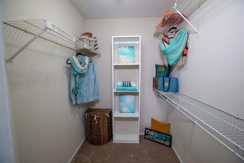 Walk-In Closet | Spacious walk-in closets with built-in organizers are featured in the master bedrooms.