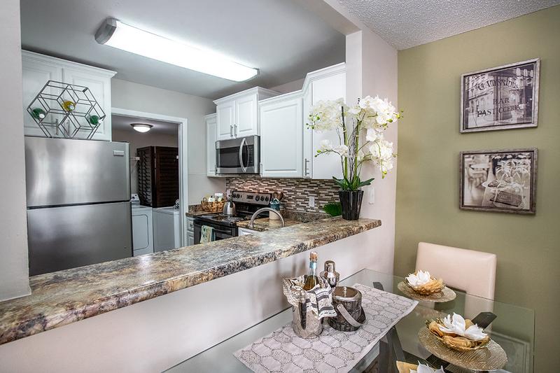 Breakfast Bar | Kitchens feature a breakfast bar overlooking the living area.