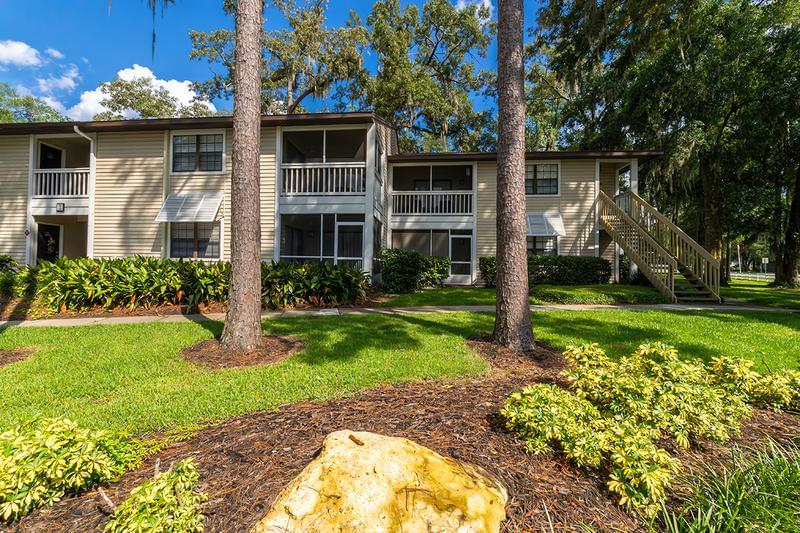 Building Exterior | You'll be welcomed home with lush landscaping and freshly painted buildings.