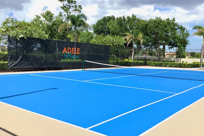 Tennis Court | Enjoy some fun in the sun while playing a game of tennis here at Adele Place.