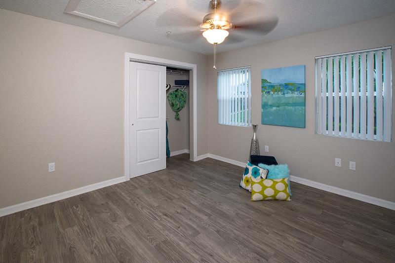 Bedroom | Spacious bedrooms featuring a multi-speed ceiling fan and a spacious closet.
