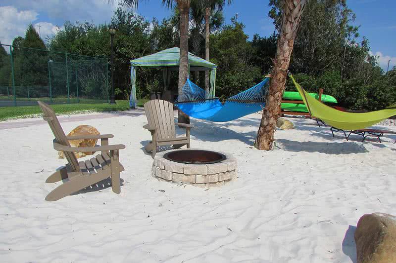 Outdoor Firepit | Enjoy a fire at our outdoor fire pit on our beach area next to the hammock garden.