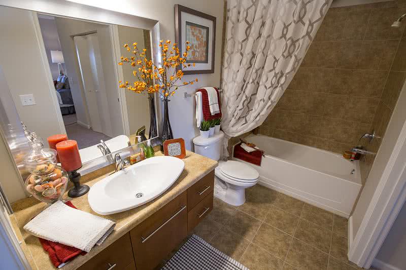 Bathroom | Updated bathrooms featuring large mirrors.