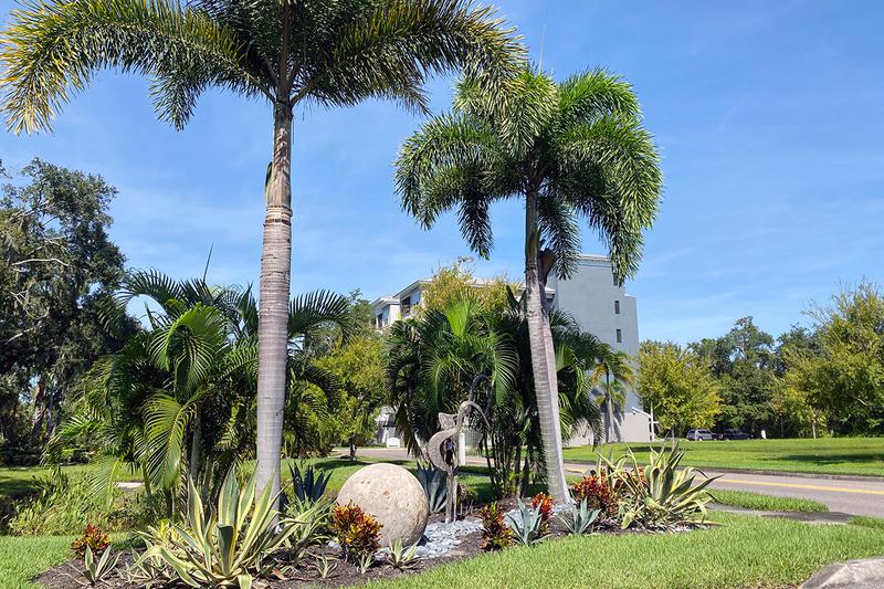 Tropical Landscaping | You'll enjoy the beautifully landscaped grounds with sculptures.