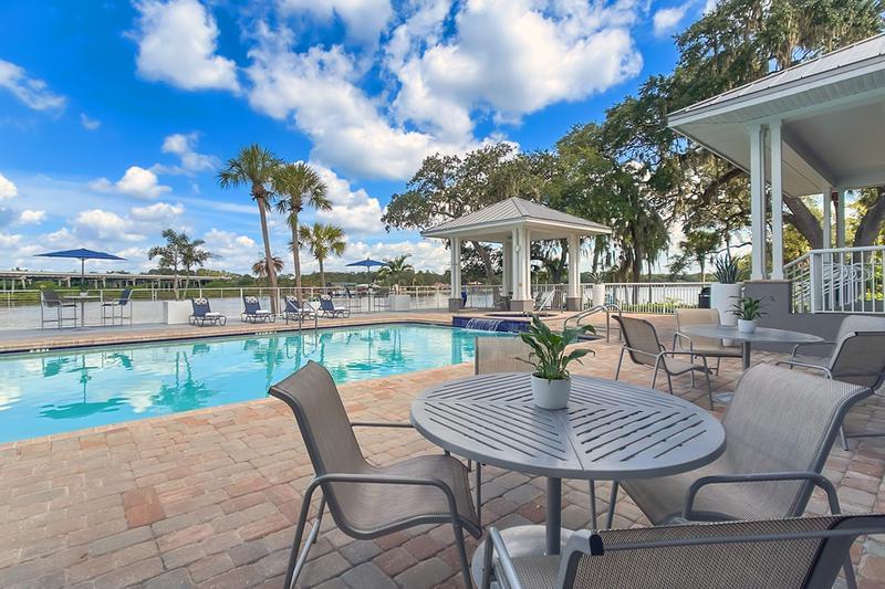 Poolside Seating | Enjoy the beautiful lake view from our poolside seating.