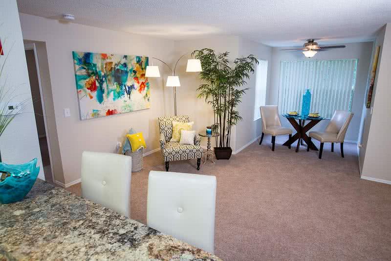 Living Room | Spacious living room area featuring a solarium, which is the perfect space for a dining room table.