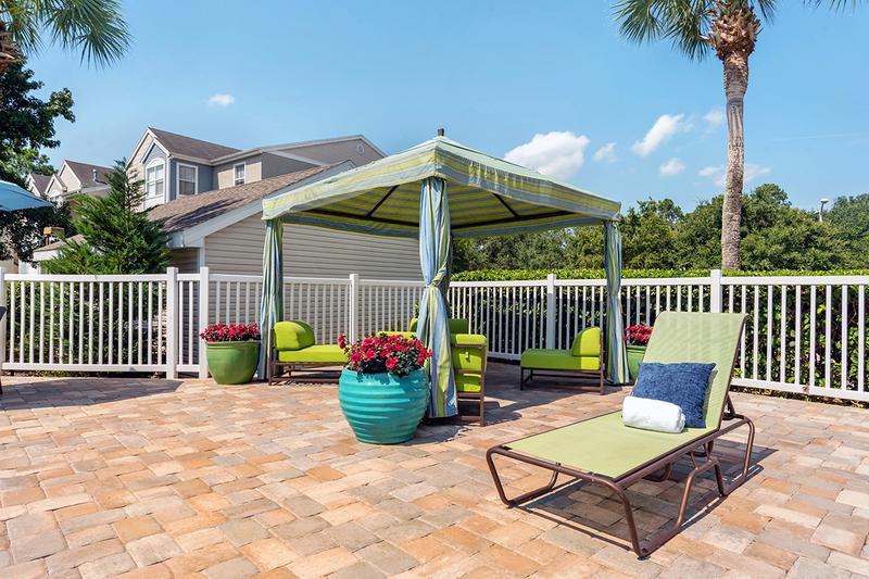 Poolside Cabanas | Relax poolside in the shade under the poolside cabana.