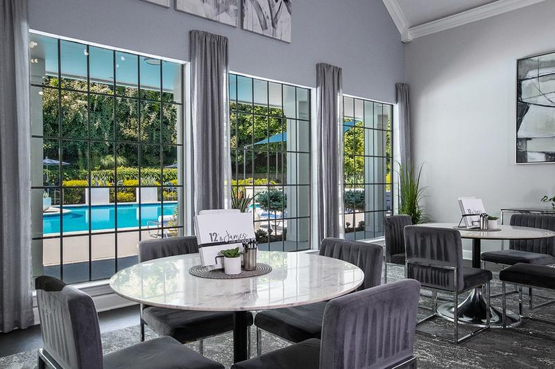 Leasing Office | Enjoy a cup of complimentary coffee while overlooking the pool in the resident clubhouse.