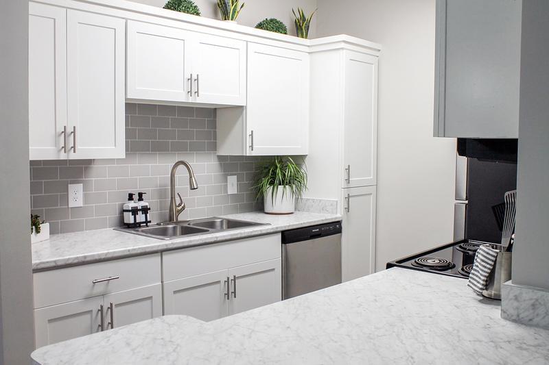 Carrara Marble Countertops | Select apartments feature Carrara marble countertops with an island!