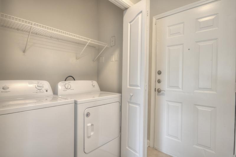 Laundry Room | Full size washer and dryer appliances included in select apartment homes.