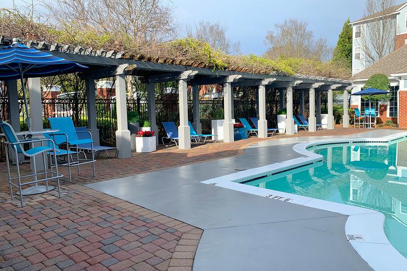 Expansive Sundeck | Lay out in our expansive sundeck under our poolside pergola.