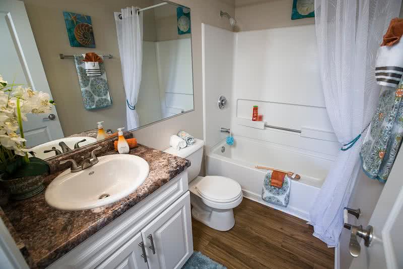 Bathroom | Spacious bathroom with extra storage space in the vanity.