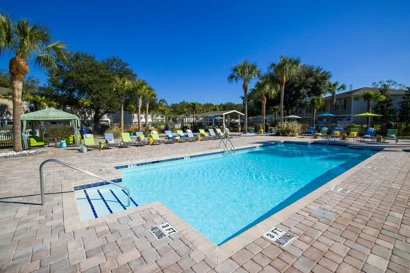 Expansive Sundeck | Relax on our expansive sundeck on one of our many poolside loungers.